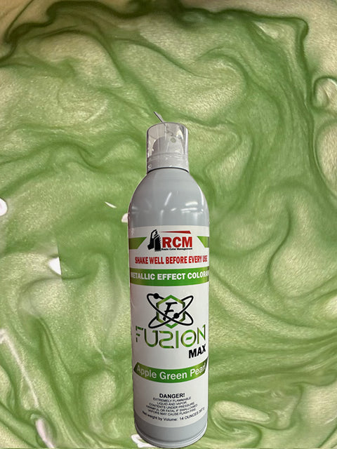 Can of RCM Fuzion Max paint on a green textured background